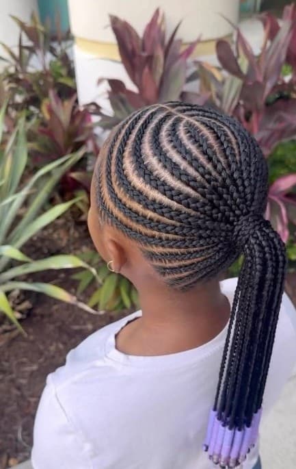 Kids braided ponytail with purple beads